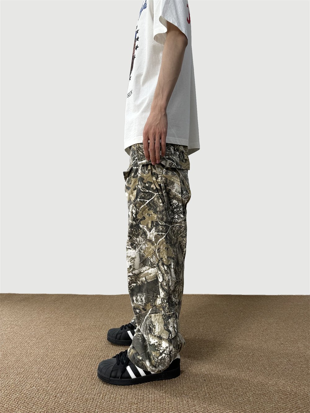d39c93bd-63a7-4f89-9d0e-6ecf53893abd.jpg Loose Straight Tree Worn Looking Washed-out Camouflage Printed Overalls